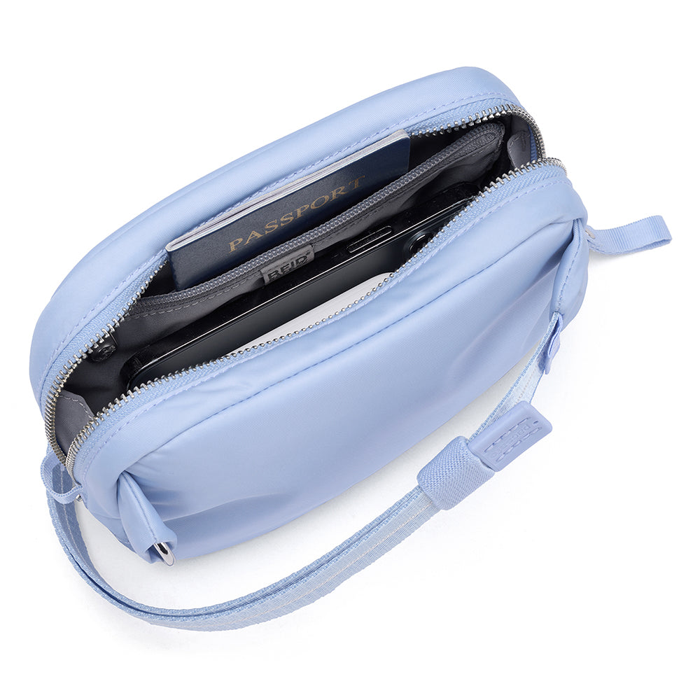 【Pacsafe】W 防盜微型斜背小包 2L|優雅外型 全面防護